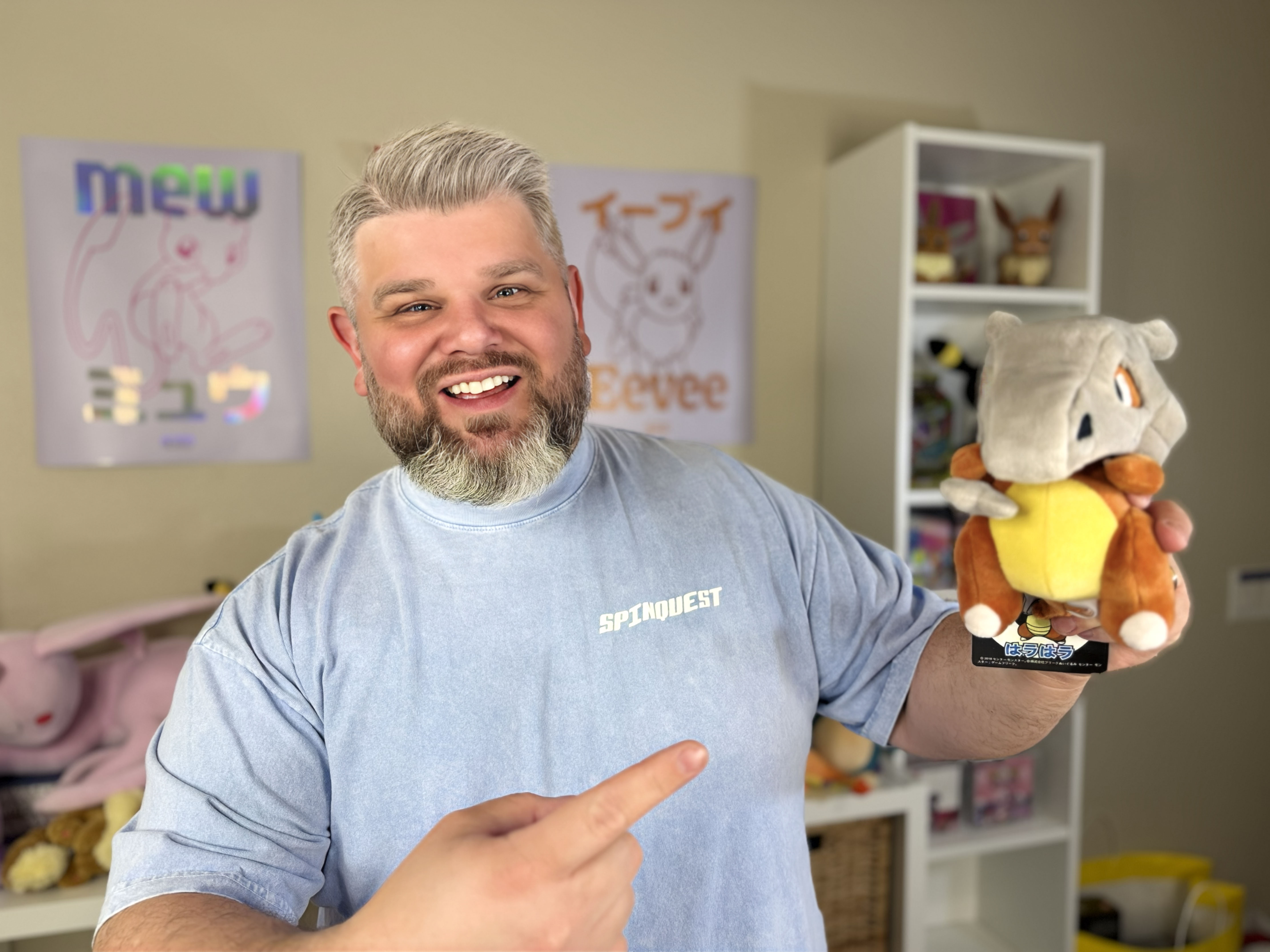 Jackpot Jonny holding a Cubone plush